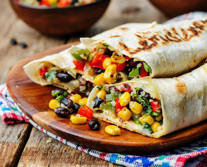 https://www.crock-pot.com/on/demandware.static/-/Sites-crockpot-Library/default/dw2538571b/bean-and-vegetable-burritos-slow-cooker-recipe.jpeg